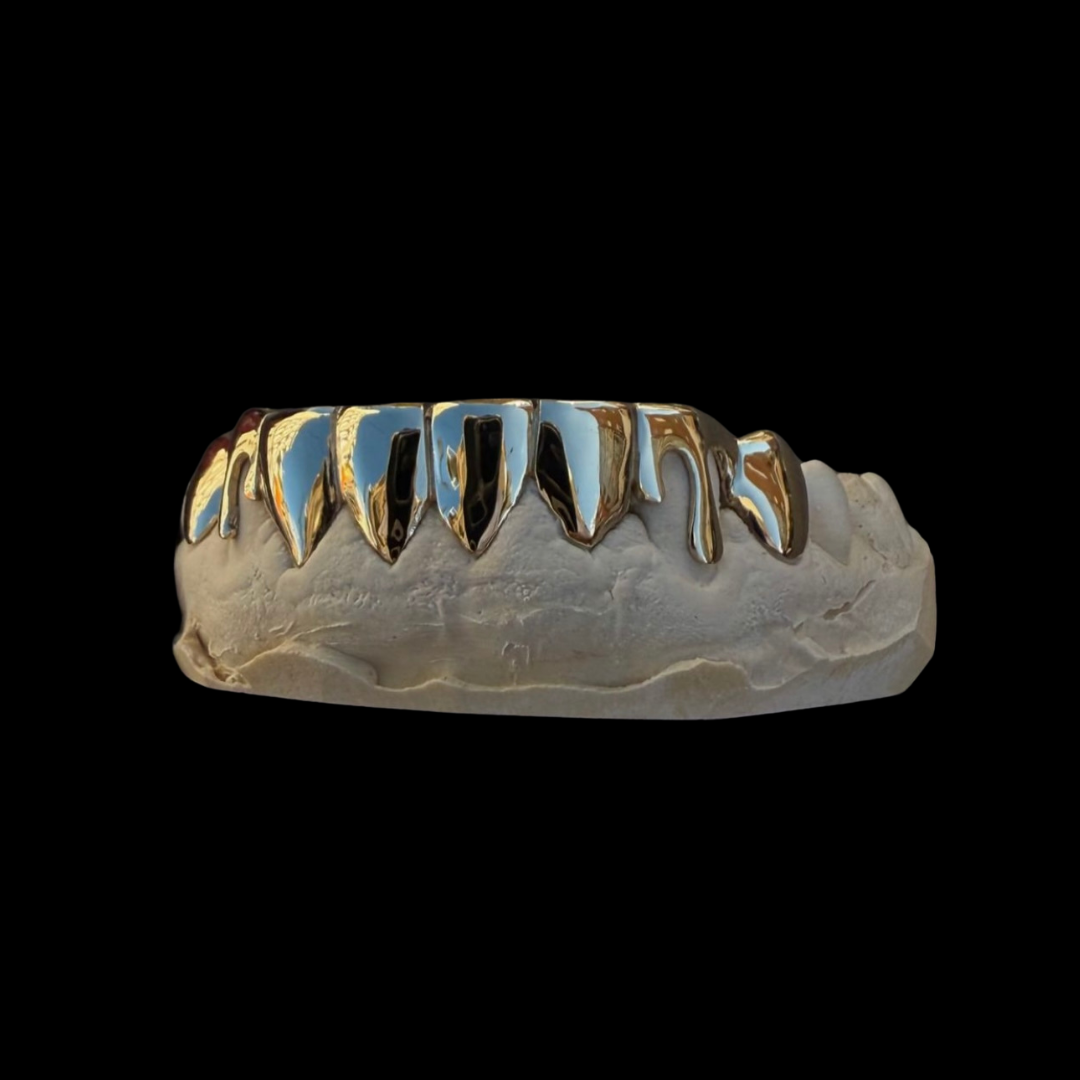 Golden child (gold grillz)