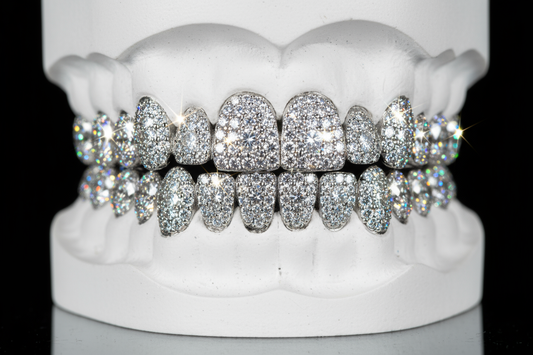 I want a realistic display of a full set of 10 teeth top and bottom of diamond grillz, white mould and black background